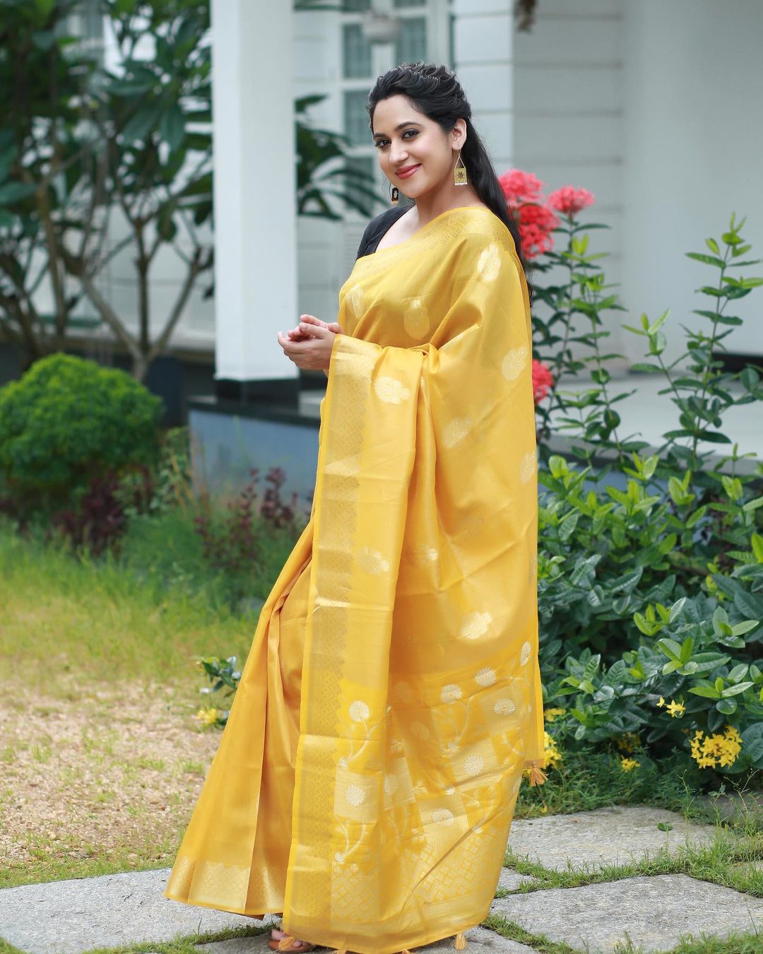 Malayalam Actress Miya George Stills in Yellow Saree Black Blouse